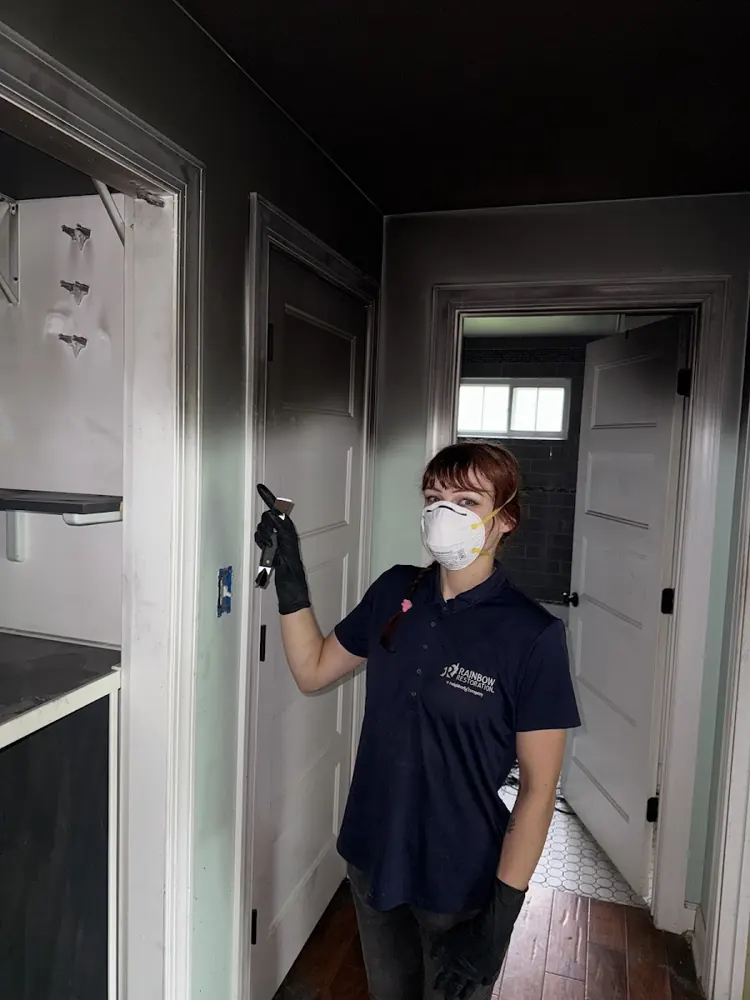 Wasatch Water & Flood Restoration technician in protective gear on a job in Salt Lake City
